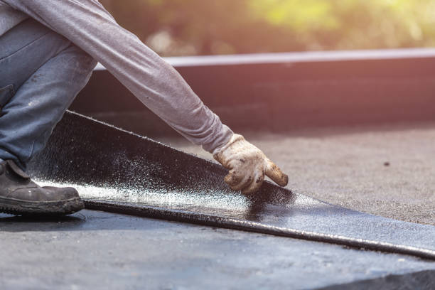 Professional Basement Waterproofing technician working in Mcbrides, MI